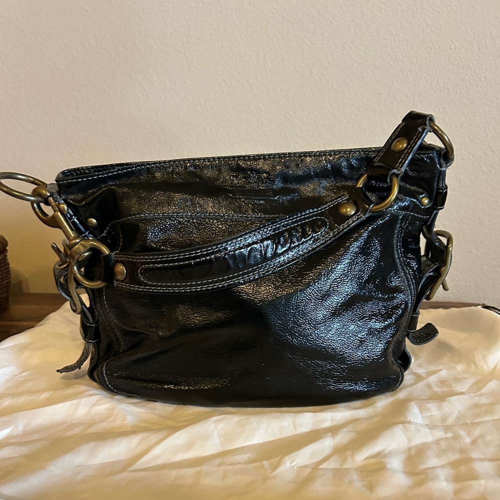Coach Vintage Black Patent Leather Hobo

Brass Hardware